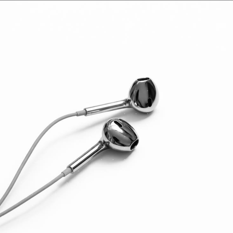 KROM earphones coiled
