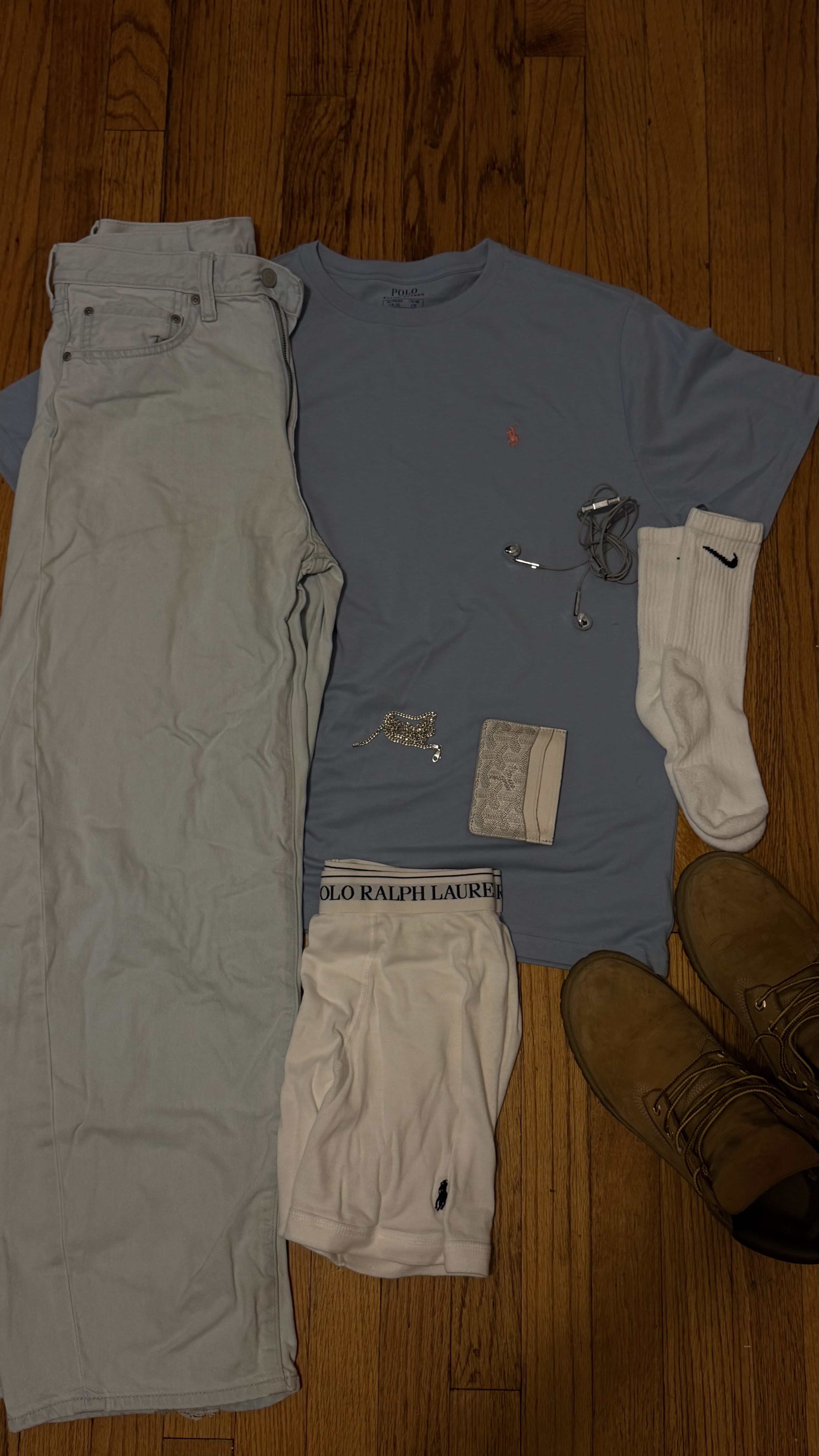 Outfit flatlay with chrome accessories